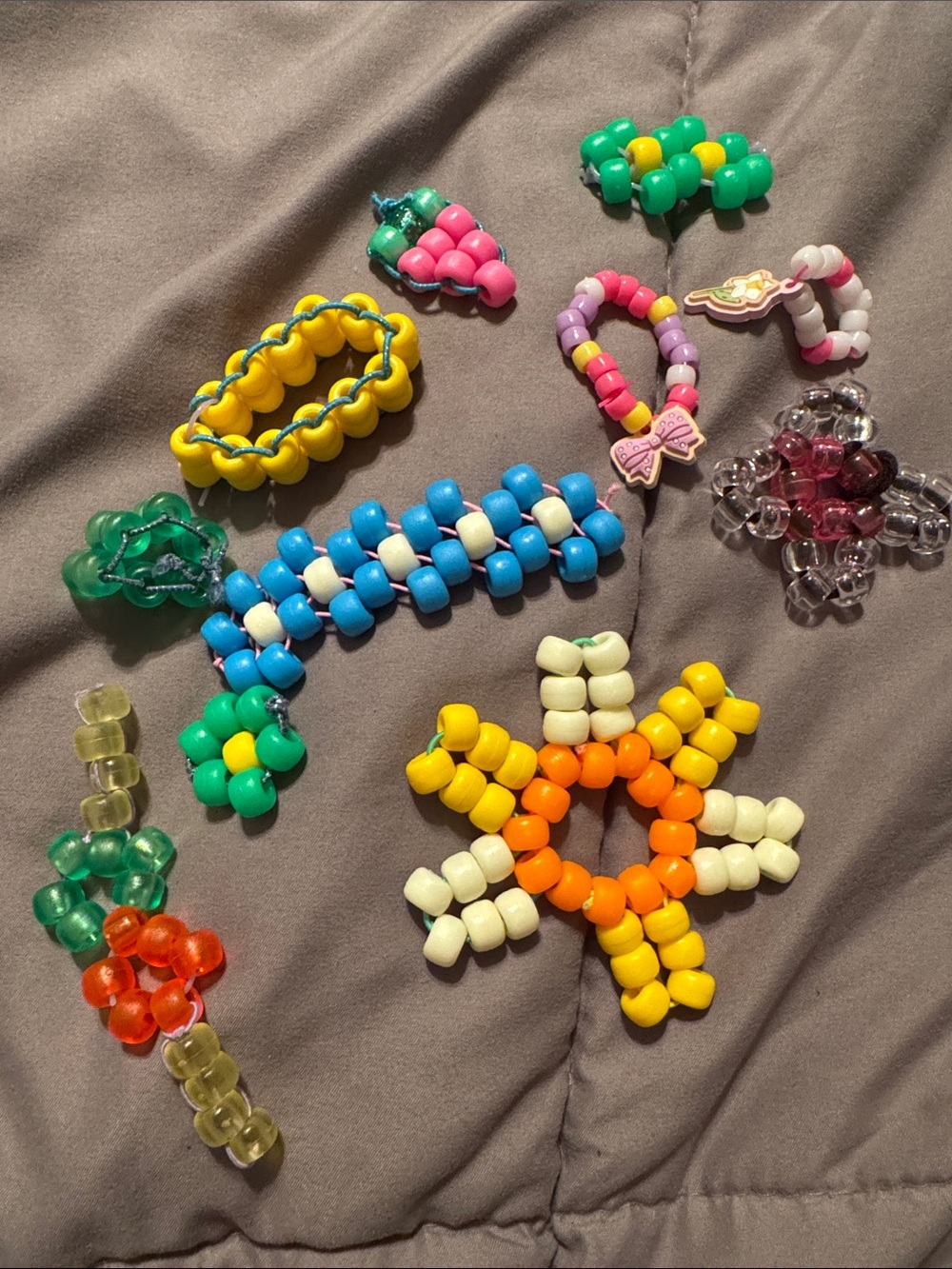 Colorful handmade "Kandi" made by 9 year old 💚
